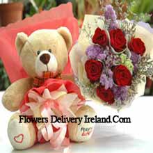Bunch Of 7 Red Roses And A Medium Sized Cute Teddy Bear Delivered in Ireland