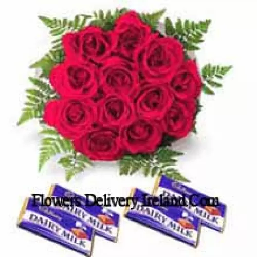 Bouquet de 11 roses rouges avec chocolats assortis