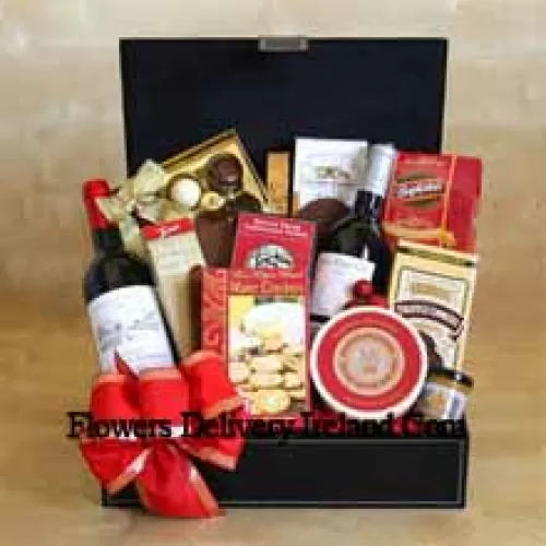 This Gift Basket includes two bottles of red wine, Gourmet crackers, Indulgent fudge, Savory almonds, Sweet truffle cookies, Merlot cheese, Napa Valley mustard, 6-piece gift box of gourmet truffles And Tasty cheese swirls. (Contents of basket including wine may vary by season and delivery location. In case of unavailability of a certain product we will substitute the same with a product of equal or higher value)