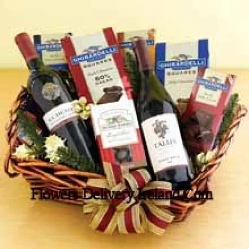 This Gift Basket Includes Two bottles of bold red wine, Chocolate-covered poppers, Assorted Ghirardelli chocolates including dark, mint and caramel bars and squares. (Contents of basket including wine may vary by season and delivery location. In case of unavailability of a certain product we will substitute the same with a product of equal or higher value)